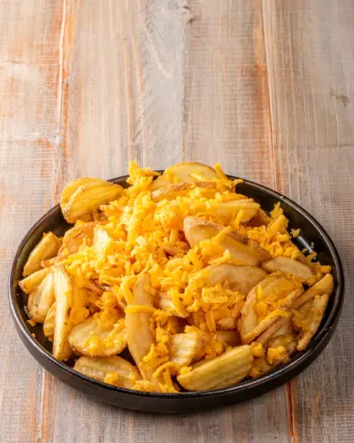 CARTOFI WEDGES CU BRANZA CHEDDAR